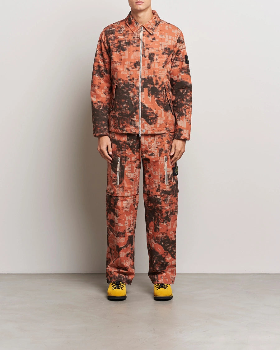 Stone Island Earth Mapping Camo cotton canvas overshirt jacket with PrimaLoft insulation technology.