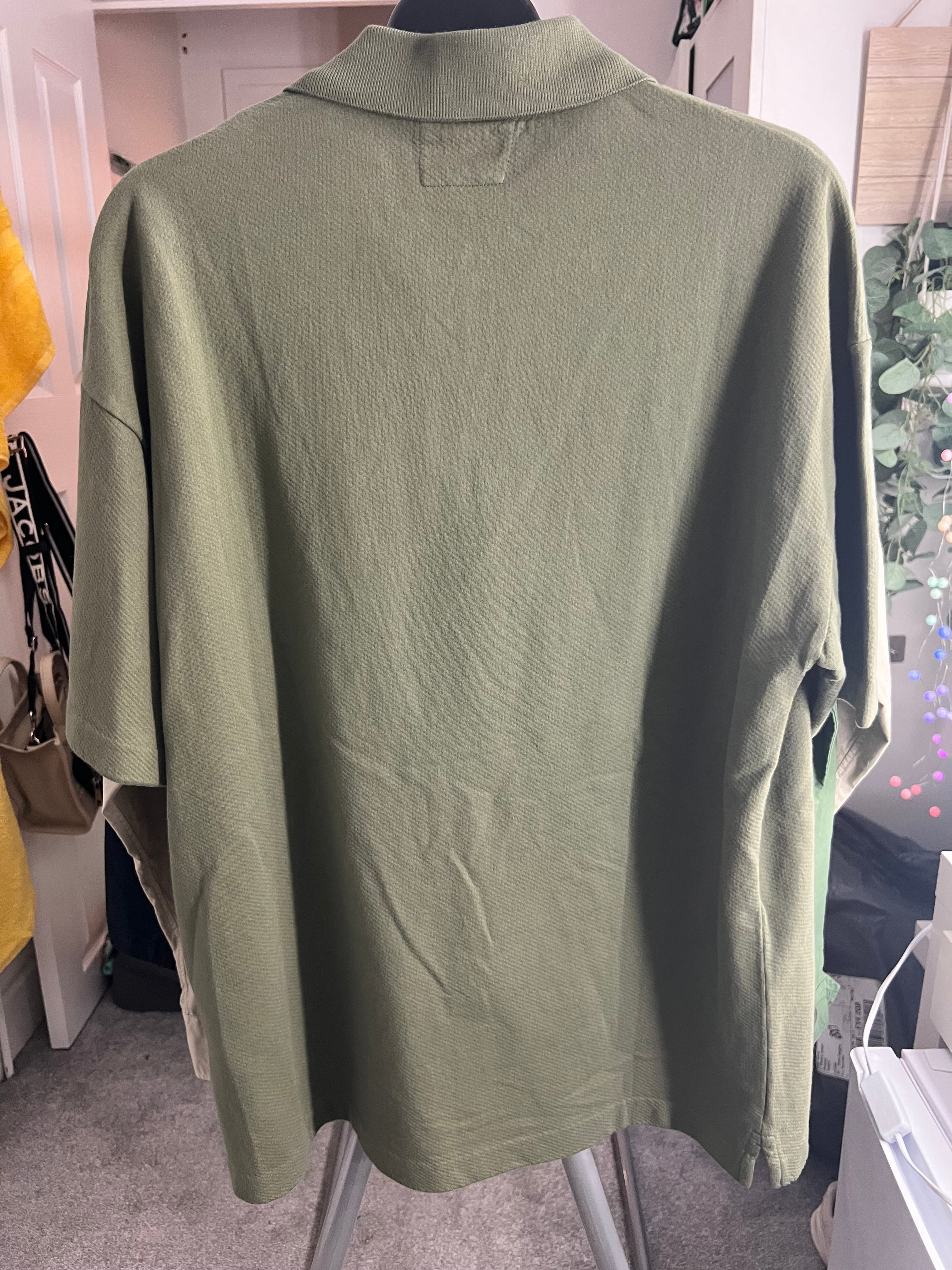 CP Company Polo Shirt raised stitch writing.