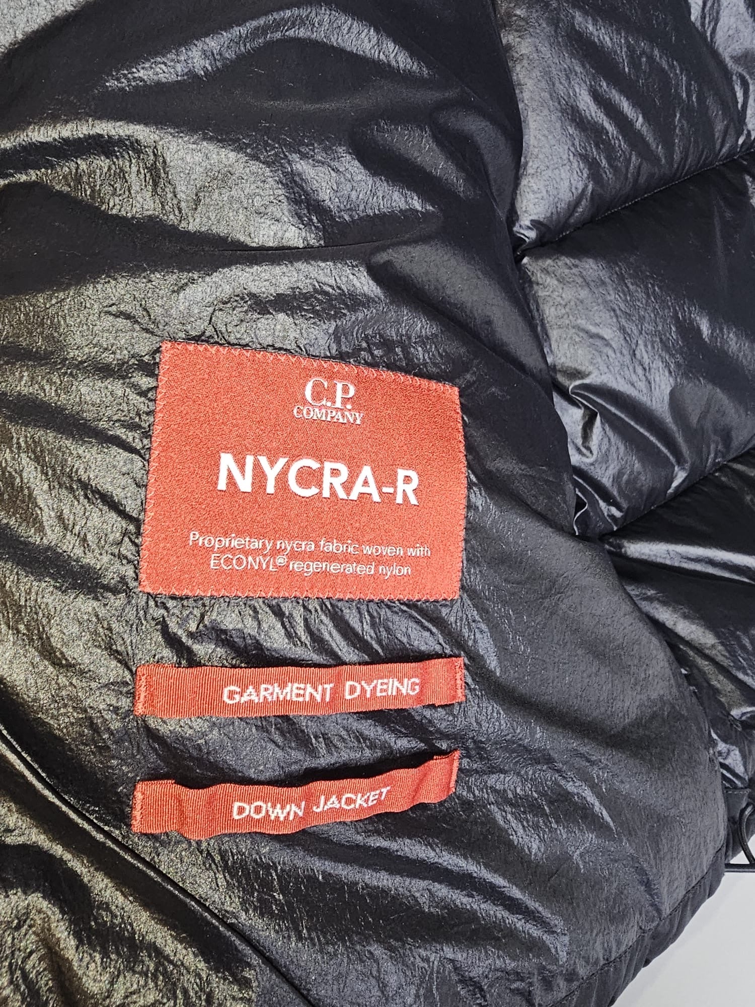 C.P Company Nycra - R Lens Jacket with foldable hood.