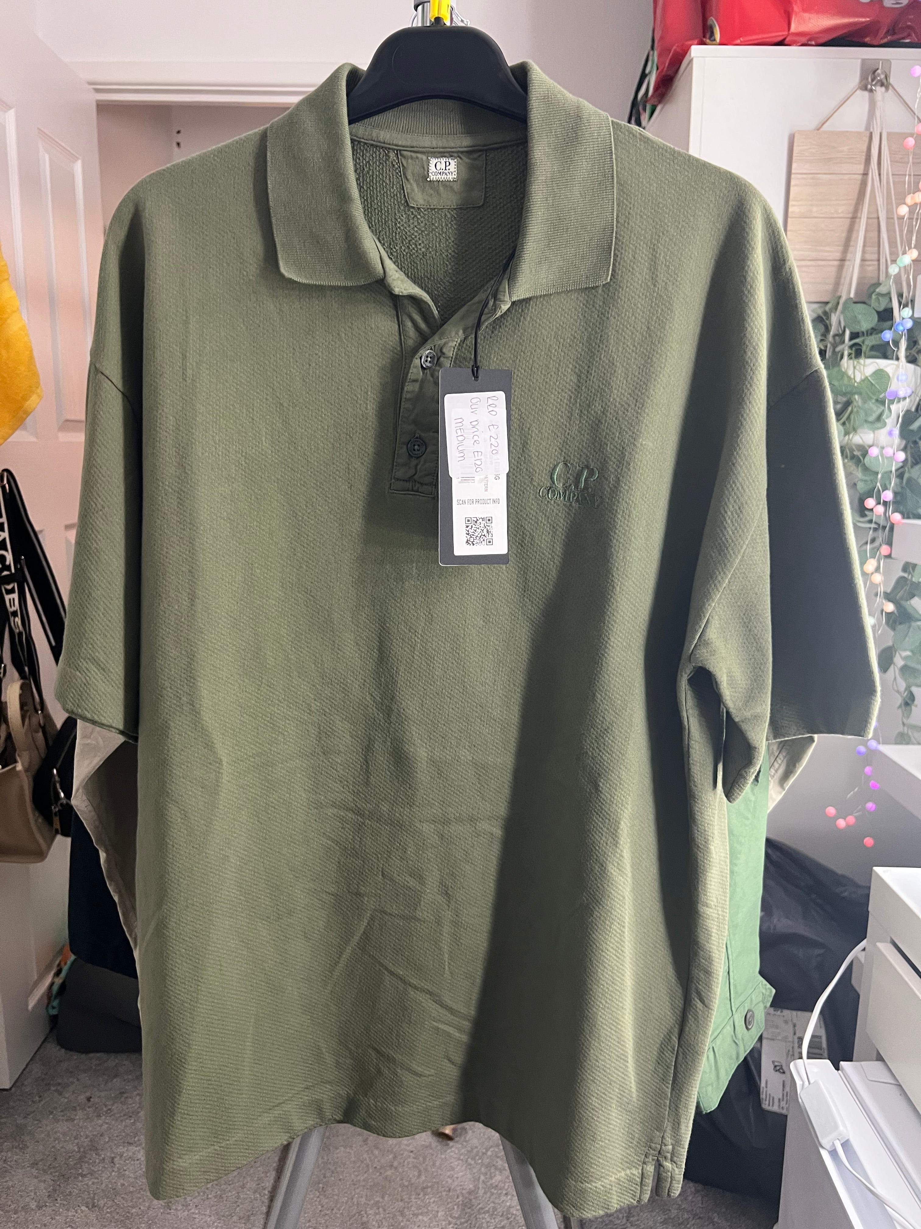 CP Company Polo Shirt raised stitch writing.