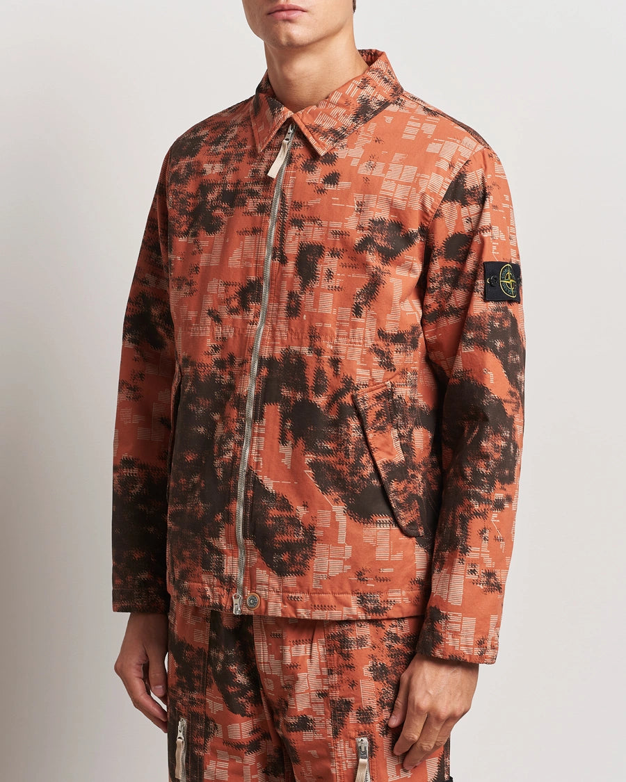 Stone Island Earth Mapping Camo cotton canvas overshirt jacket with PrimaLoft insulation technology.