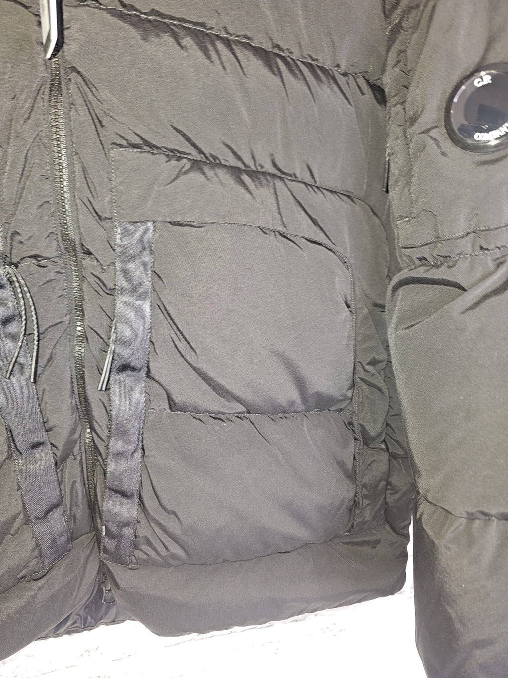 C.P Company Nycra - R Lens Jacket with foldable hood.