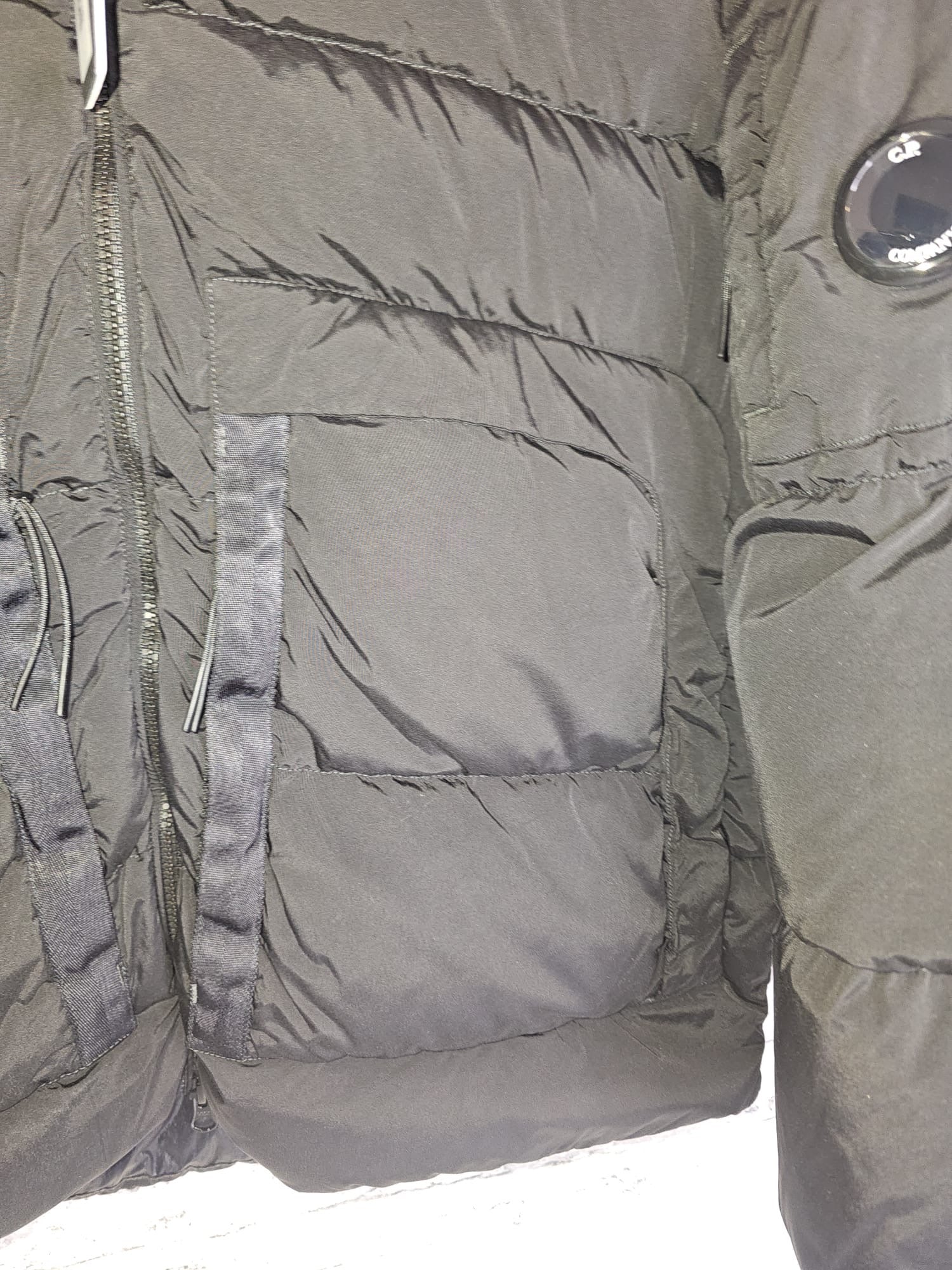 C.P Company Nycra - R Lens Jacket with foldable hood.