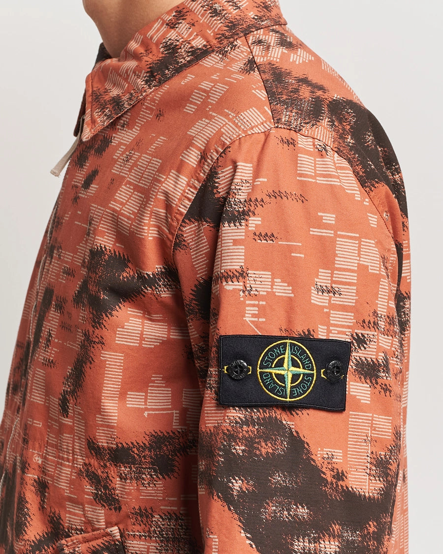 Stone Island Earth Mapping Camo cotton canvas overshirt jacket with PrimaLoft insulation technology.