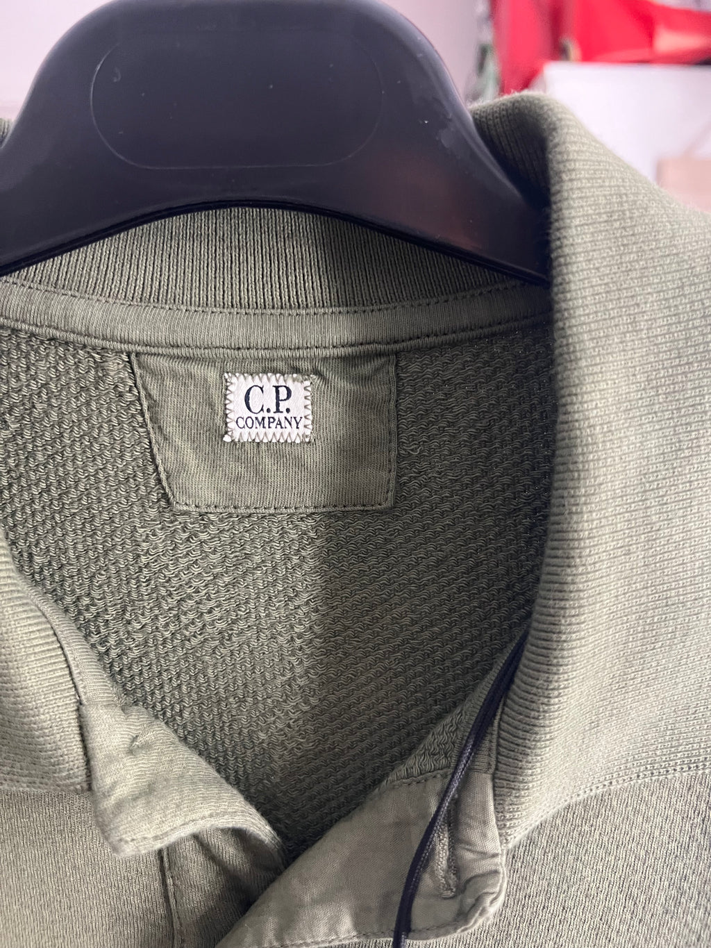 CP Company Polo Shirt raised stitch writing.