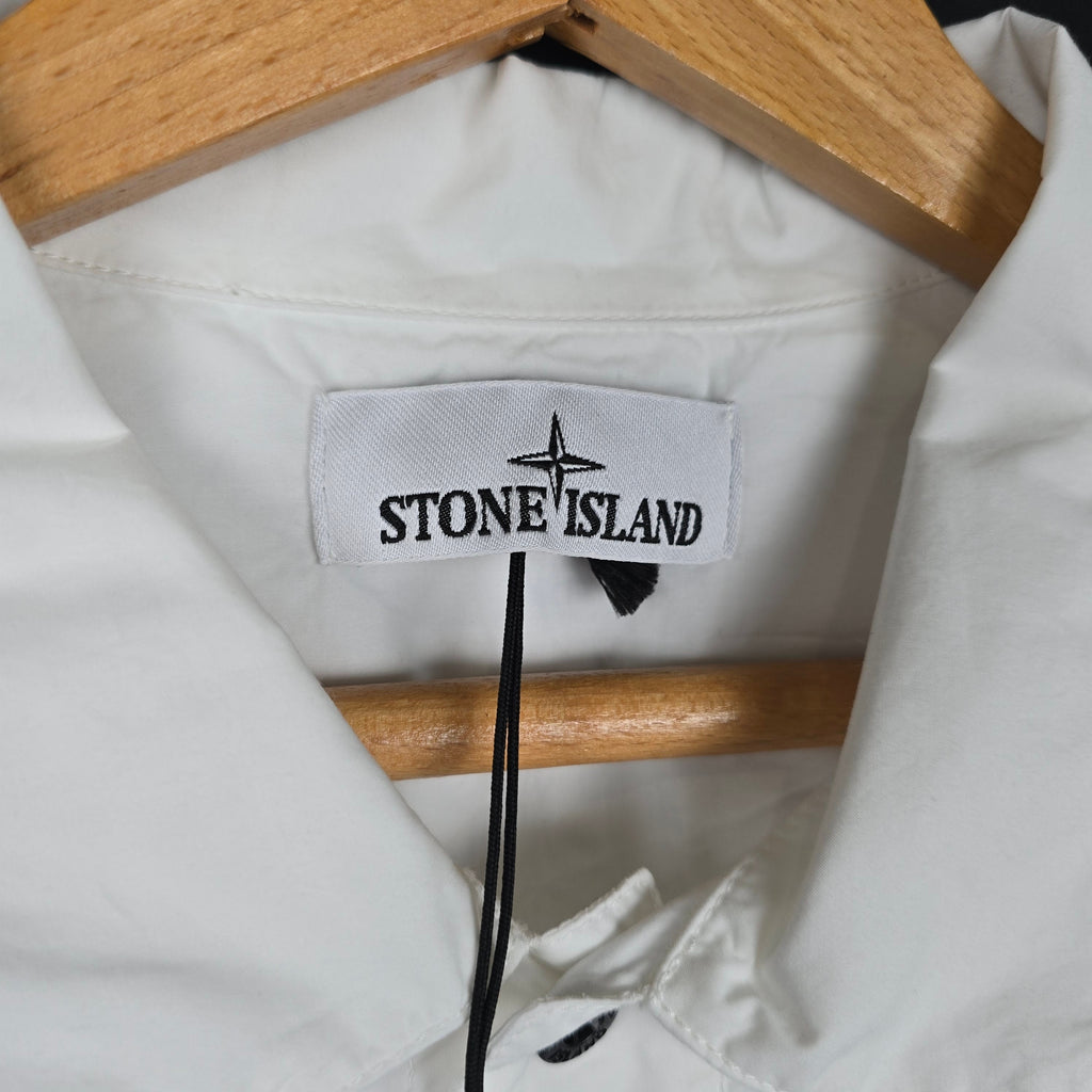 Stone Island white short sleeve shirt front view on hanger